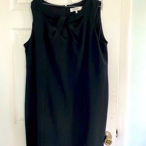 Black, Jones NY dress. Sleeveless with decorative front.